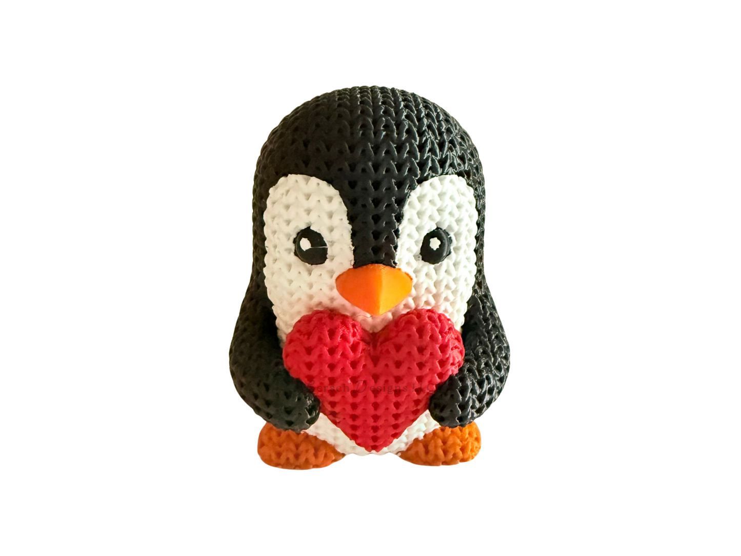 Knitted Penguin Holding Heart