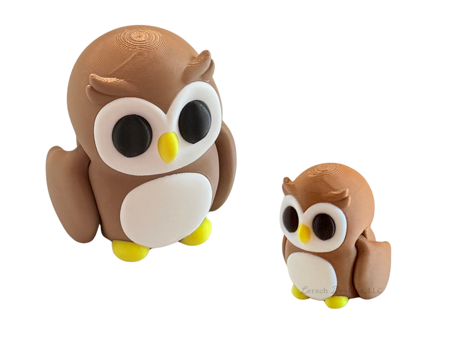Two cute 3D owl figurines in different sizes, featuring a brown body, white chest, yellow beak and feet, and large black eyes, set against a plain white background.